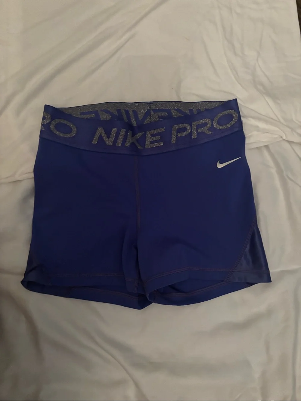 Nike Pro Women's Blue Compression Bike Shorts with Silver Logo